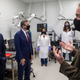 Professor Detlef Knappe, right, leads Michael Regan, left, the head of the Environmental Protection Agency, and North Carolina Gov. Roy Cooper on a tour of a laboratory that tests water samples for “forever chemicals,” or PFAS, on Oct. 18, 2021.
